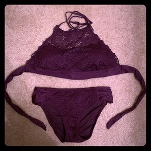 2 piece purple bathing suit.